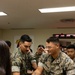 USO serves pizza to MWSS-172 for their efforts | Typhoon Khanun