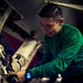 Sailor Performs Maintenance Aboard USS Carl Vinson (CVN 70)