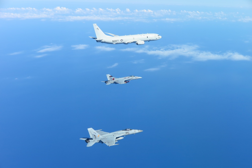 &quot;Tomcatters&quot; and &quot;Golden Warriors&quot; escort P-8A