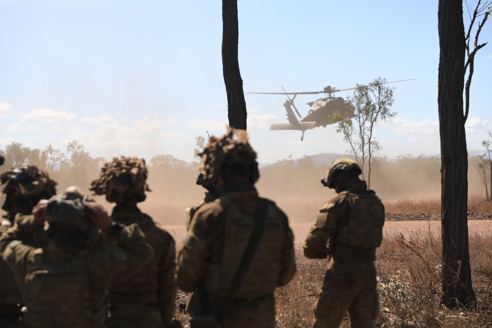 Australian Soldiers conduct air mobile ops in support of Battle Group Eagle's Armoured Battle Run