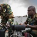 Members of the Ghana Army troubleshoot machinery at the Africa Malaria Task Force (AMTF) conference, July 18, 2023.