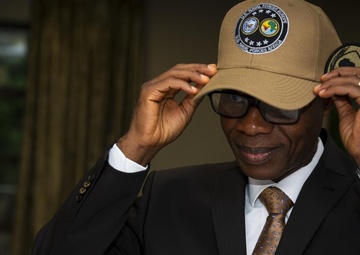ACCRA, GHANA –– Prof. N’Dri Athanase Yao, Brig. Gen. (Ret.), dons a U.S. Naval Forces Africa, U.S. Naval Forces Africa command ball cap.