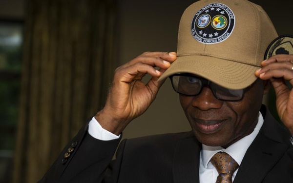 ACCRA, GHANA –– Prof. N’Dri Athanase Yao, Brig. Gen. (Ret.), dons a U.S. Naval Forces Africa, U.S. Naval Forces Africa command ball cap.