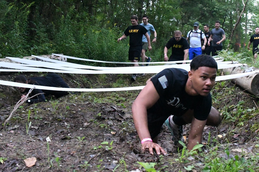 Ten years and still muddy: Fort Drum community members dive into Mountain Mudder