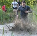 Ten years and still muddy: Fort Drum community members dive into Mountain Mudder