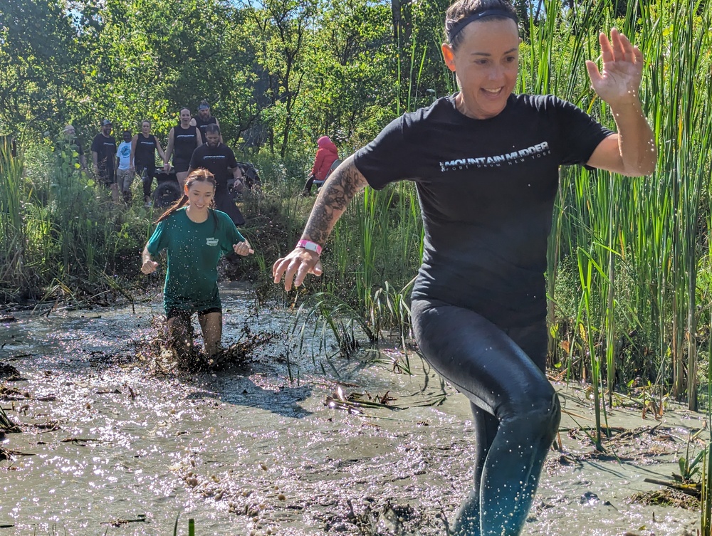 Ten years and still muddy: Fort Drum community members dive into Mountain Mudder