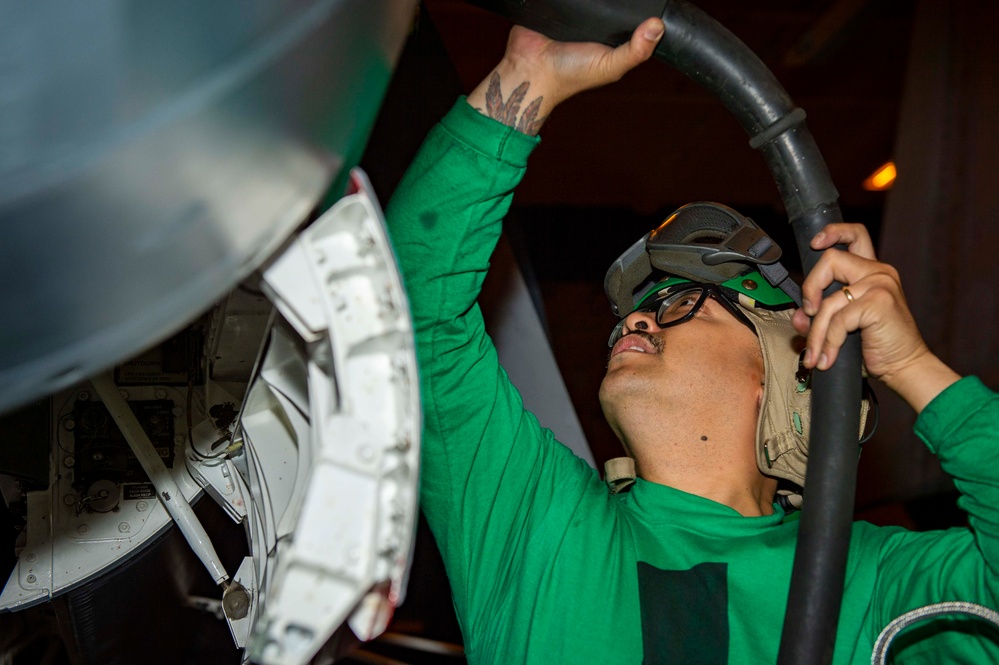 USS Carl Vinson (CVN 70) Sailors Perform Maintenance on Aircrafts in the Pacific Ocean