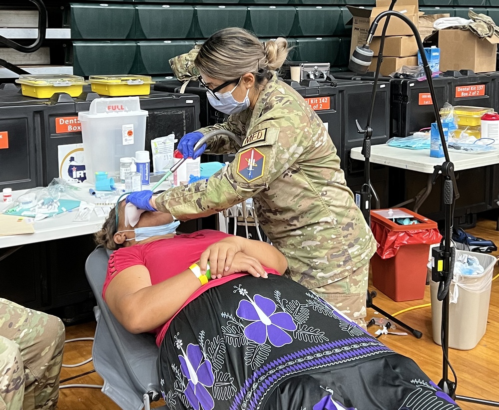 Dental assistant serves during Guam Wellness IRT