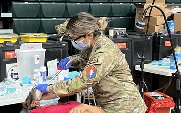Dental assistant serves during Guam Wellness IRT