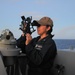 Sailor Measures Distance with Sextant