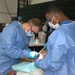 Dentist assists in Guam Wellness IRT