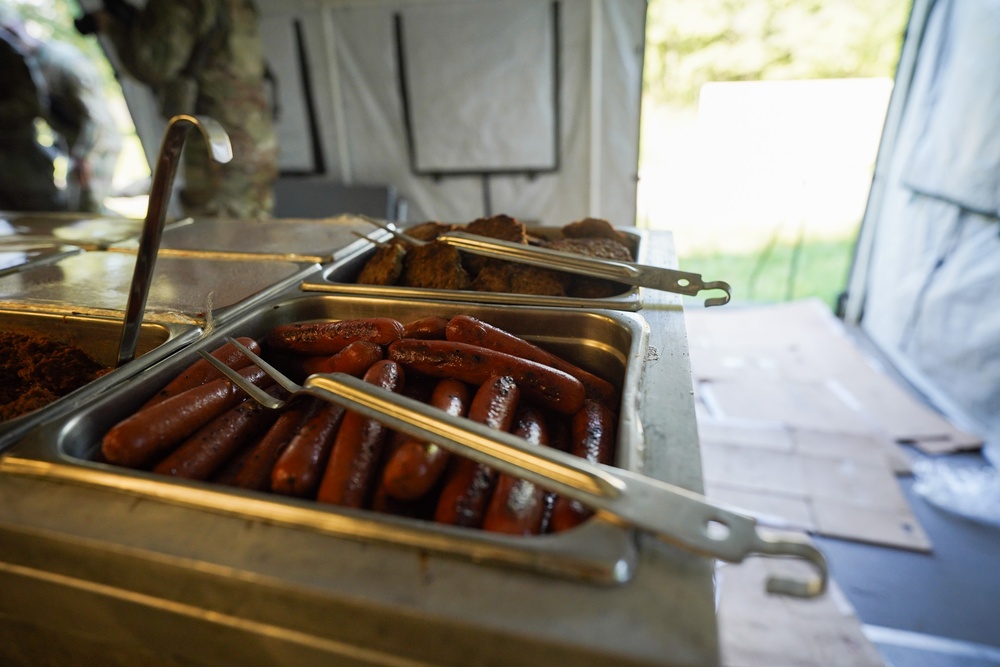 Sustainment Soldiers Prepare Meals in Field Environment