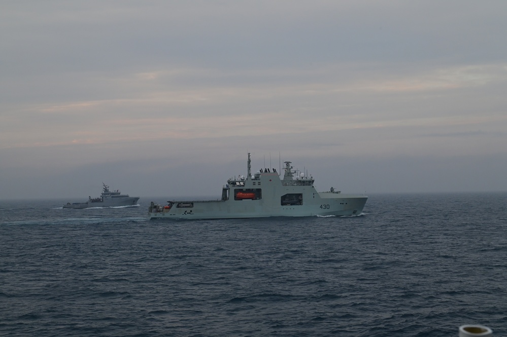 Coast Guard conducts formation steaming exercises with the French and Canadian navy for Op Nanook