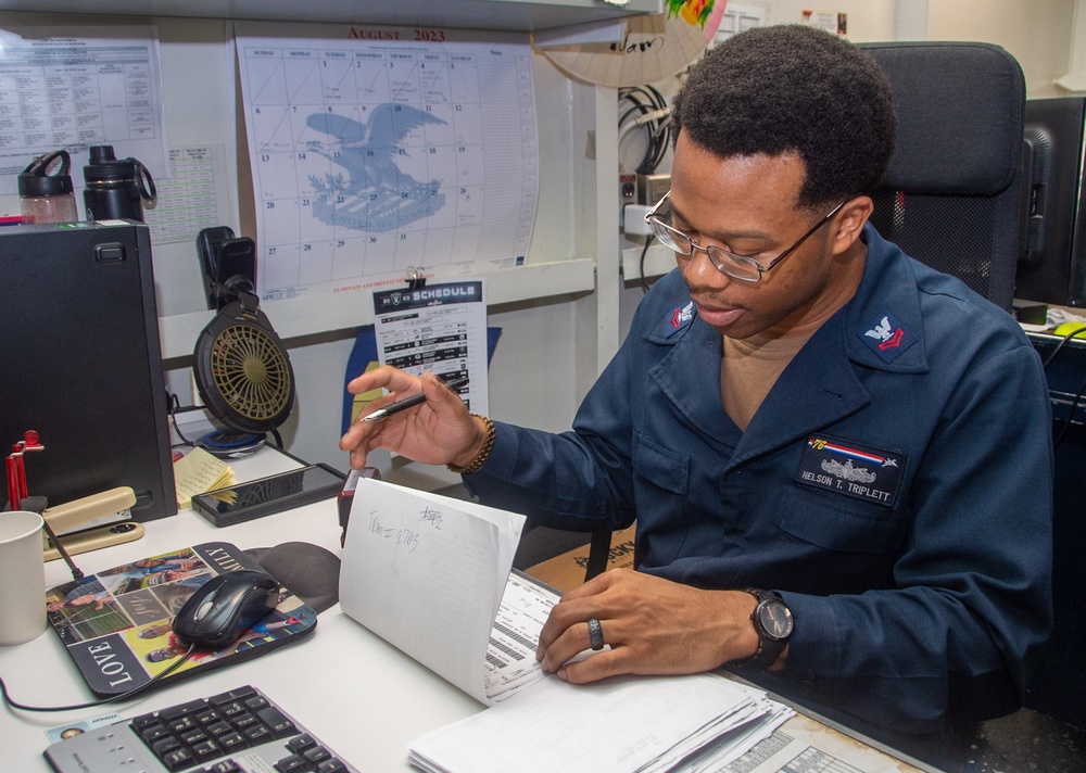 USS Ronald Reagan (CVN 76) supply Sailors conduct daily operations