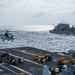 USS Ronald Reagan (CVN 76) conducts replenishment-at-sea with USNS Yukon (T-AO 202) and USNS Carl Brashear (T-AKE 7)