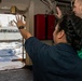 USS Ronald Reagan (CVN 76) conducts replenishment-at-sea with USNS Yukon (T-AO 202) and USNS Carl Brashear (T-AKE 7)