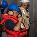 USS Ronald Reagan (CVN 76) conducts replenishment-at-sea with USNS Yukon (T-AO 202) and USNS Carl Brashear (T-AKE 7)
