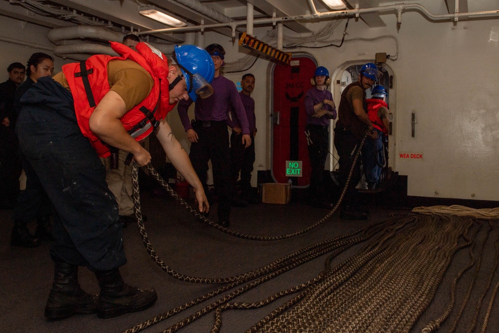 USS Ronald Reagan (CVN 76) conducts replenishment-at-sea with USNS Yukon (T-AO 202) and USNS Carl Brashear (T-AKE 7)