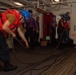 USS Ronald Reagan (CVN 76) conducts replenishment-at-sea with USNS Yukon (T-AO 202) and USNS Carl Brashear (T-AKE 7)