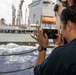 USS Ronald Reagan (CVN 76) conducts replenishment-at-sea with USNS Yukon (T-AO 202) and USNS Carl Brashear (T-AKE 7)