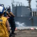 USS Ronald Reagan (CVN 76) conducts replenishment-at-sea with USNS Yukon (T-AO 202) and USNS Carl Brashear (T-AKE 7)