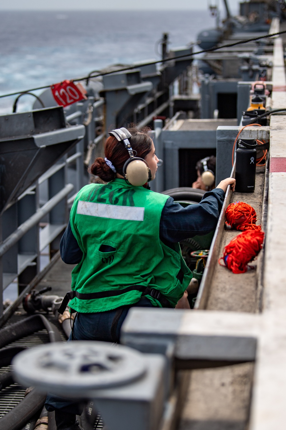 USS Ronald Reagan (CVN 76) conducts replenishment-at-sea with USNS Yukon (T-AO 202) and USNS Carl Brashear (T-AKE 7)