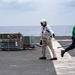 USS Ronald Reagan (CVN 76) conducts replenishment-at-sea with USNS Yukon (T-AO 202) and USNS Carl Brashear (T-AKE 7)