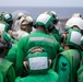 USS Ronald Reagan (CVN 76) conducts replenishment-at-sea with USNS Yukon (T-AO 202) and USNS Carl Brashear (T-AKE 7)