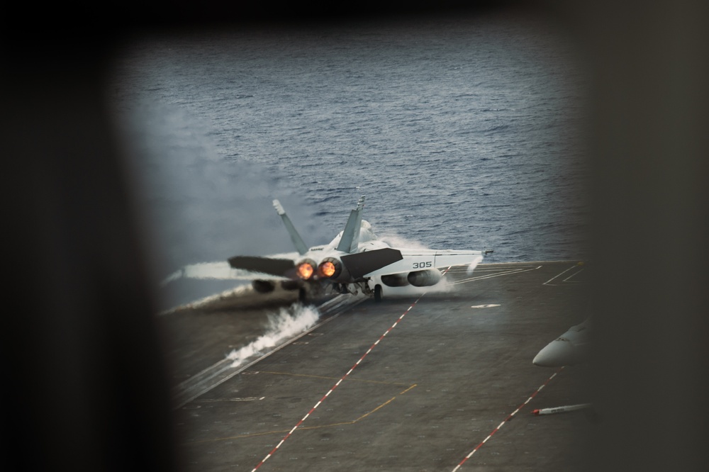 An F/A 18E launches off the flight deck of USS Carl Vinson (CVN 70)