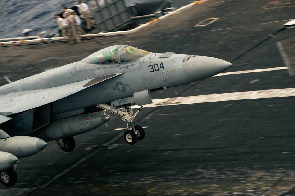 An F/A 18E recovers on the flight deck of USS Carl Vinson (CVN 70)