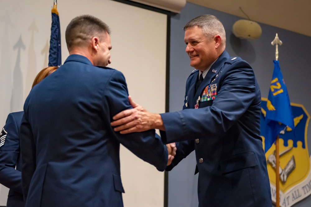 Cook receives Meritorious Service Medal