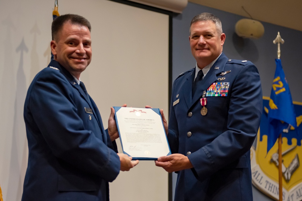 Cook receives Meritorious Service Medal