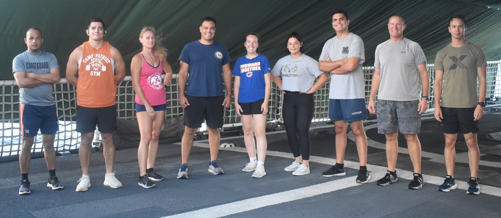 The crew of Coast Guard Cutter Resolute celebrate the Coast Guard's birthday with a workout