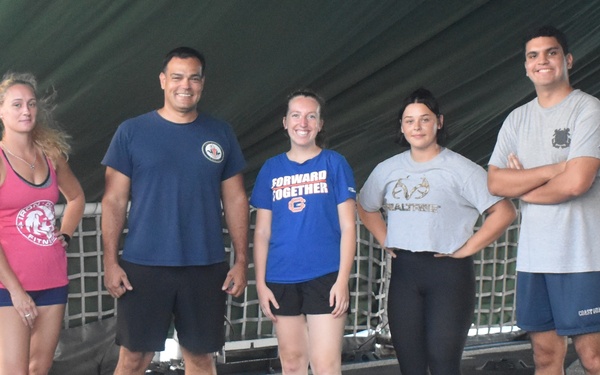 The crew of Coast Guard Cutter Resolute celebrate the Coast Guard's birthday with a workout