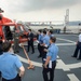 Korea Coast Guard Members Tour USCG Munro