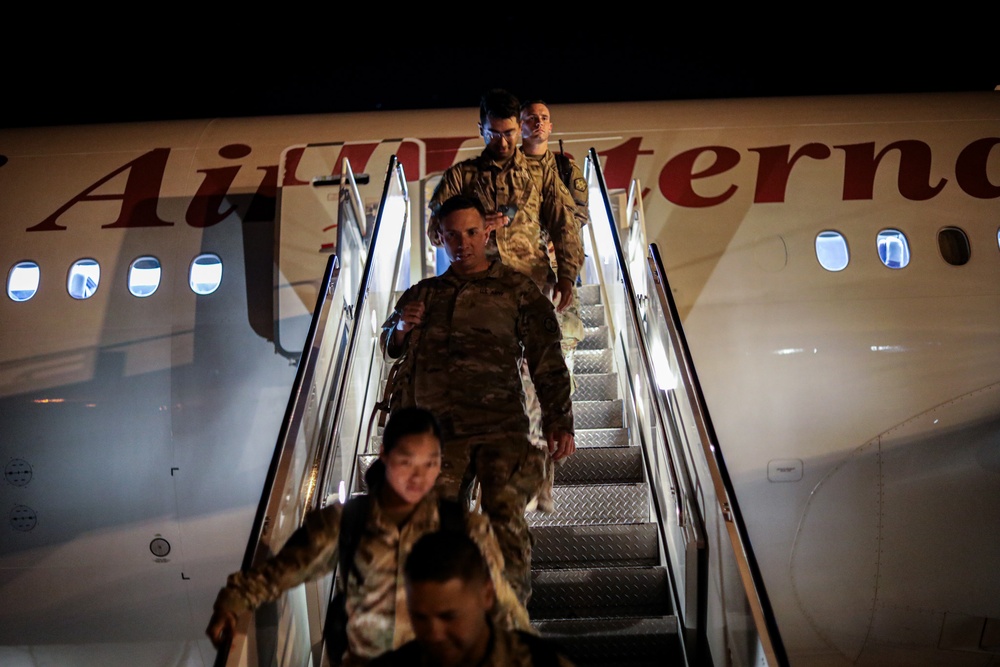 Soldiers with the 673rd Quartermaster Company return home from deployment