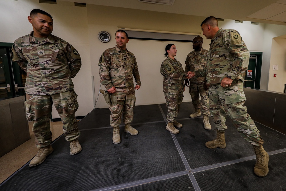 Soldiers with the 673rd Quartermaster Company return home from deployment