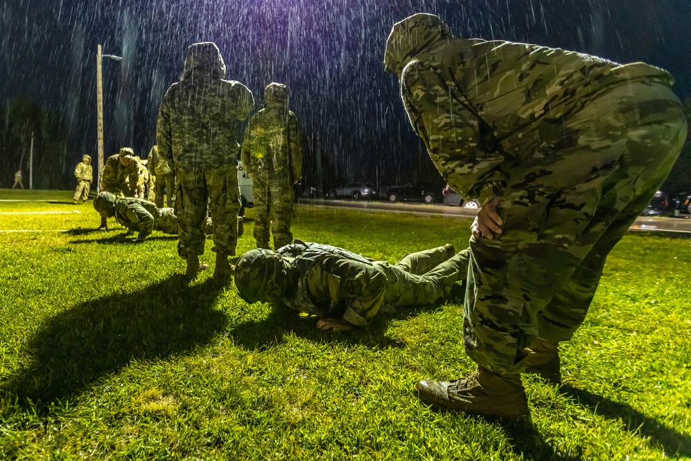 Expert Soldier Badge candidates do push ups
