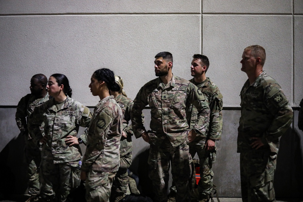 Soldiers with the 673rd Quartermaster Company return home from deployment