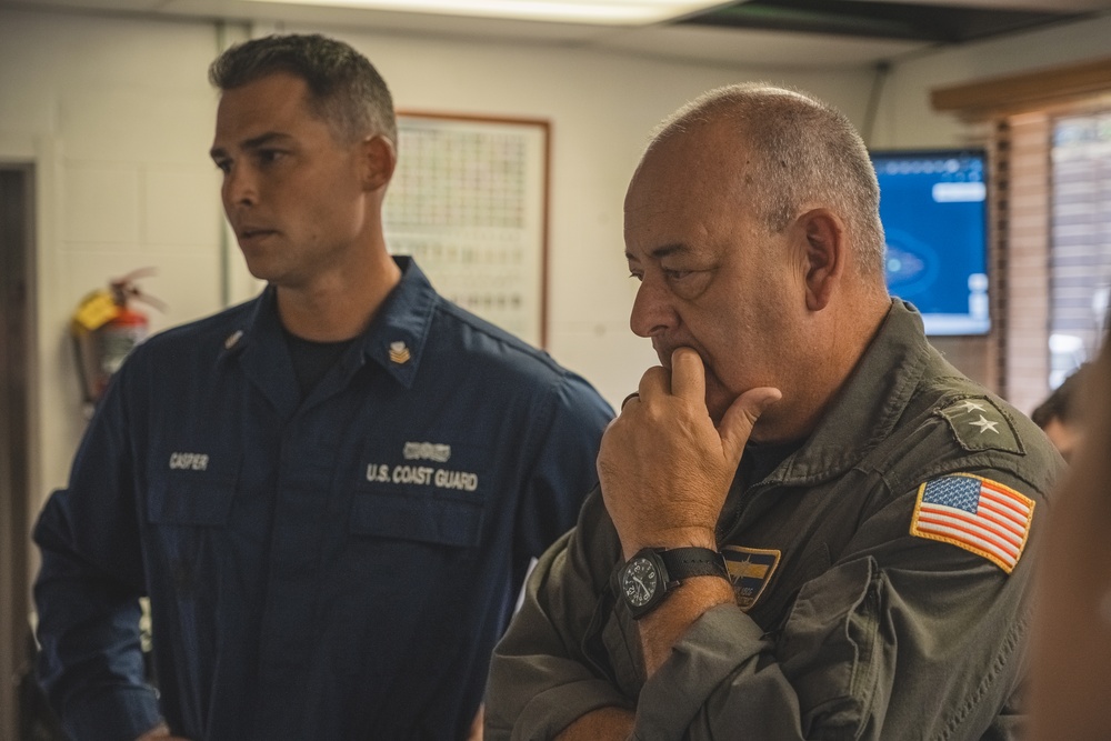 BM1 Casper updates Admiral Day on the Maui Fires response