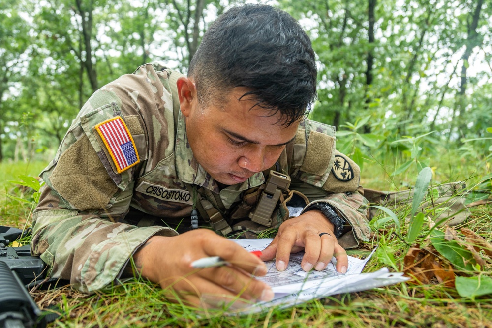 Spc. Dominic Crisostomo determines his route