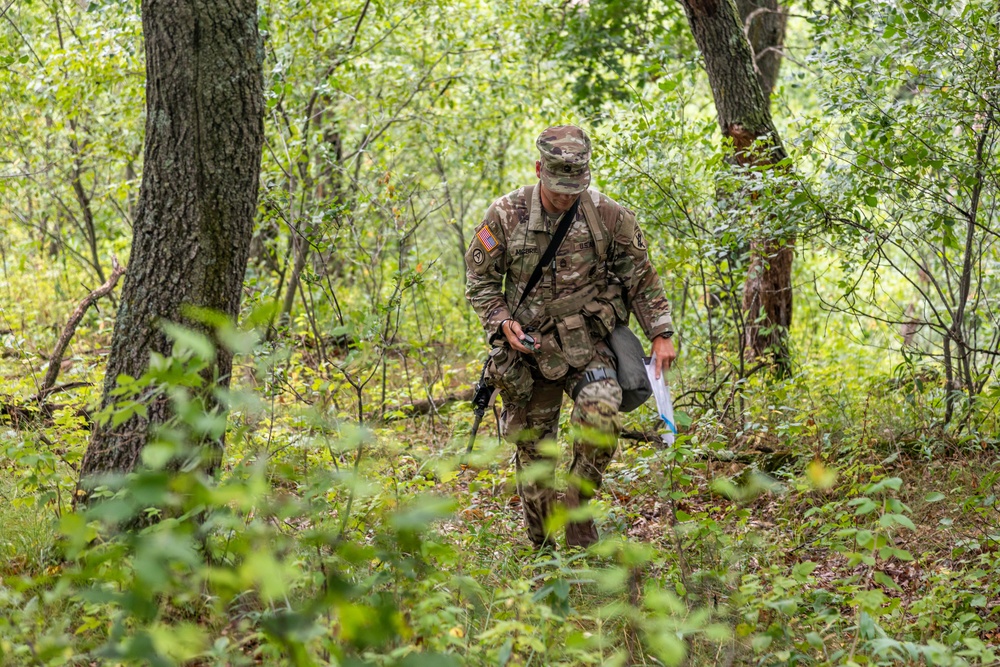 Sgt. 1st Class Christopher Mcbride searches for his point