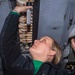 Sailor Performs Maintenance on a F/A-18E Super Hornet Aboard USS Carl Vinson (CVN 70)