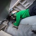 Sailor Performs Maintenance on a MH-60S Sea Hawk Aboard USS Carl Vinson (CVN 70)