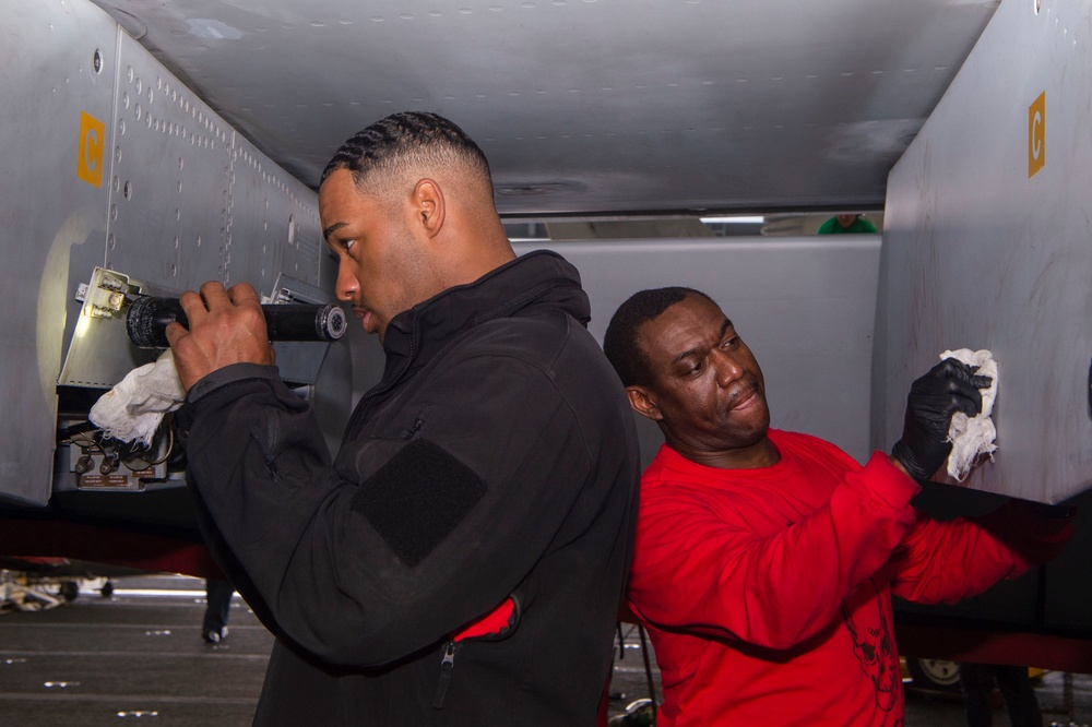 Sailors Perform Corrosion Treatment and Prevention on F/A-18F Super Hornet Aboard USS Carl Vinson (CVN 70)