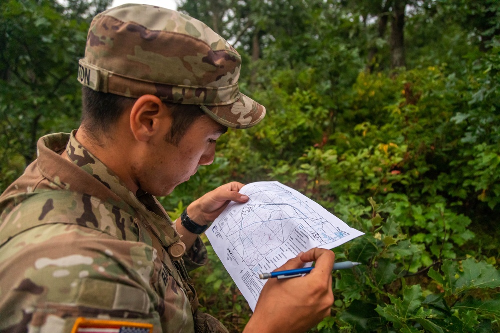 Sgt. Andrew Ralston checks his map