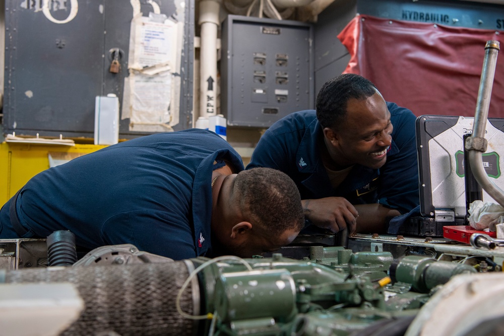 Sailors Conduct Maintenance