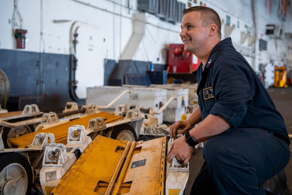 Sailor Conducts Maintenance