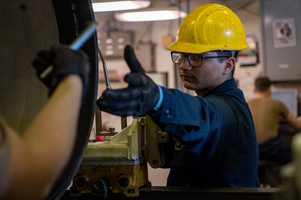 Sailor Conducts Maintenance