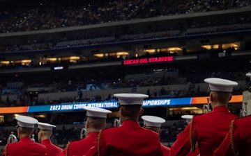 Marines with “The Commandant’s Own,” U.S. Marine Drum and Bugle Corps, perform for 22,000 plus guests at the Drum Corps International in Indianpolis.